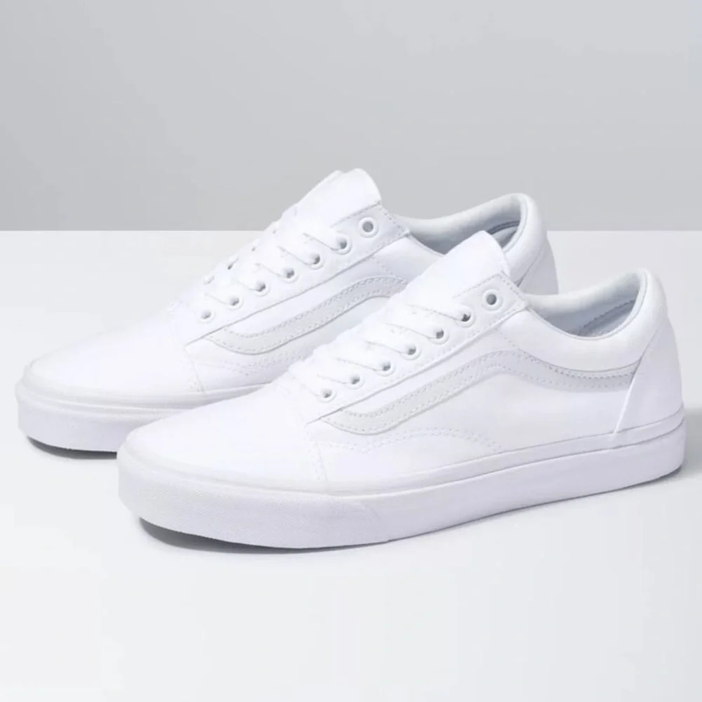 Vans All-White Low-Top Sneakers